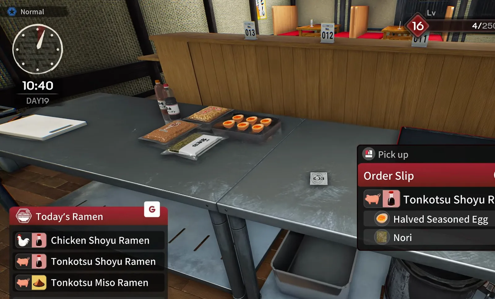 Japanese Ramen Simulator order slip for tonkotsu shoyu ramen with halved seasoned egg and nori while a tray of sliced eggs and nori packs sit on the stainless prep counter Japanese Ramen Simulator order slip for tonkotsu shoyu ramen with halved seasoned egg and nori while a tray of sliced eggs and nori packs sit on the stainless prep counter