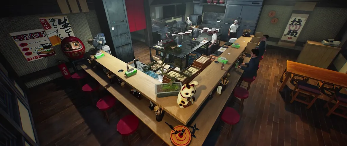 Official Japanese Ramen Simulator gameplay clip frame: overhead view of the wooden counter lined with red stools, a daruma doll and lucky cat on the counter, chefs working in the kitchen behind and customers seated along the line Official Japanese Ramen Simulator gameplay clip frame: overhead view of the wooden counter lined with red stools, a daruma doll and lucky cat on the counter, chefs working in the kitchen behind and customers seated along the line