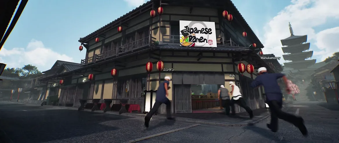 Japanese Ramen Simulator several name-tagged characters running toward the noren entrance of the corner ramen shop on a sunny street, player labels ManukaHoney, ニンゲン and fish floating over their heads
