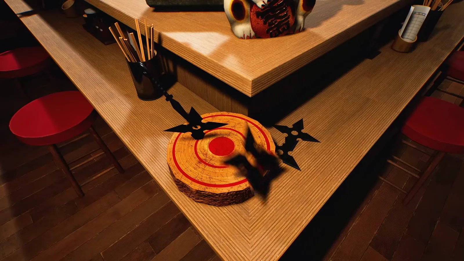 Wooden counter corner in Japanese Ramen Simulator with a log-slice target painted with red rings, four black shuriken in the target, mid-air, on the counter and in a chopstick holder, and a red daruma behind