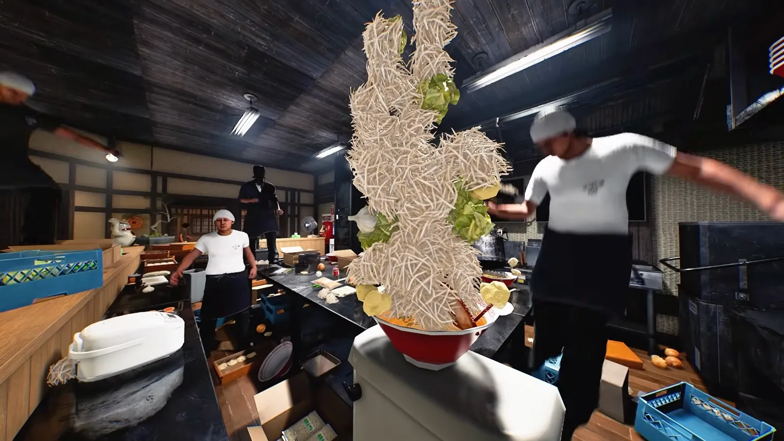 Pale noodle-and-sprout topping tower climbing from a red bowl past the fluorescent ceiling lights in a Japanese Ramen Simulator kitchen, with two cooks in white shirts and black aprons and blue crates and cardboard scattered on the counter